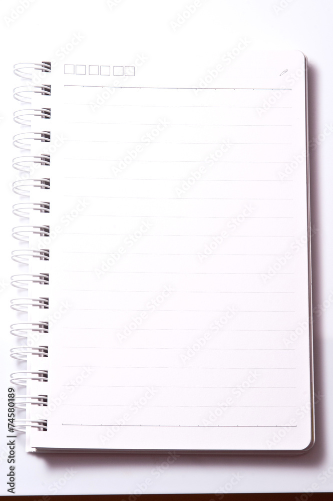 Blank Spiral Notebook with Line Paper Isolated on a White Backgr Blank Spiral Notebook with Line Paper Isolated on a White Backgr