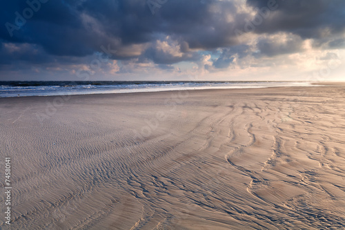 sunrise over North sea sand beach