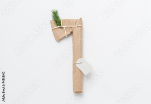 Axe gift wrapped over white background