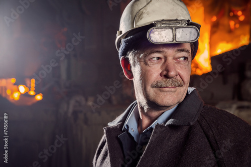 Worker of a metallurgical factory photo