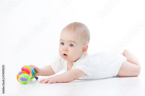 Baby with a toy