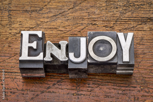 enjoy word in metal type