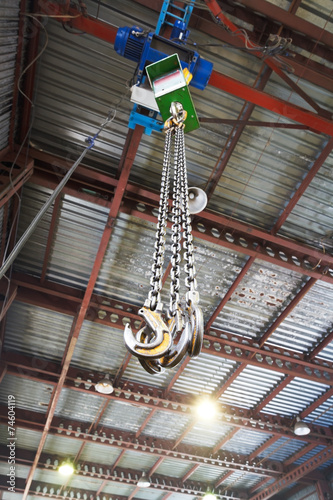 hooks of weigher bridge crane in warehouse