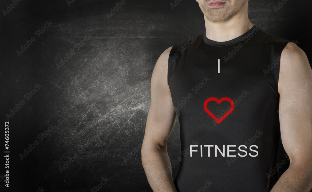 Caucasian male fit model on black background. Caucasian male fit model on black background.