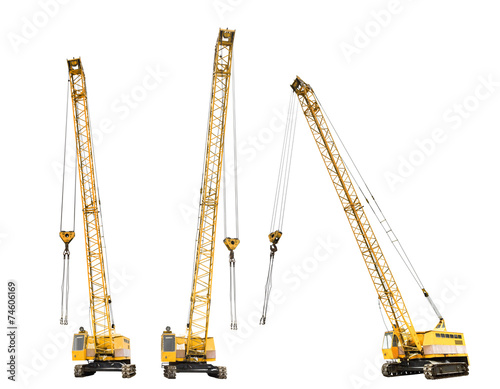 set of construction yellow crawler cranes isolated