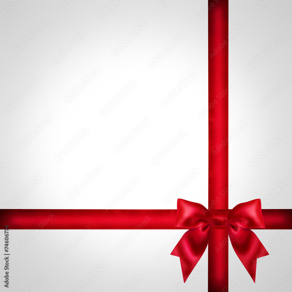 Red ribbon bow on grey background. Red ribbon bow on grey background.