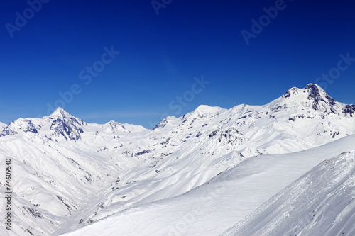 Snowy mountain peaks in sun nice day © BSANI