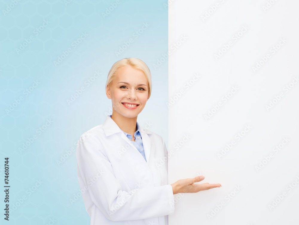 smiling female doctor with white blank board smiling female doctor with white blank board