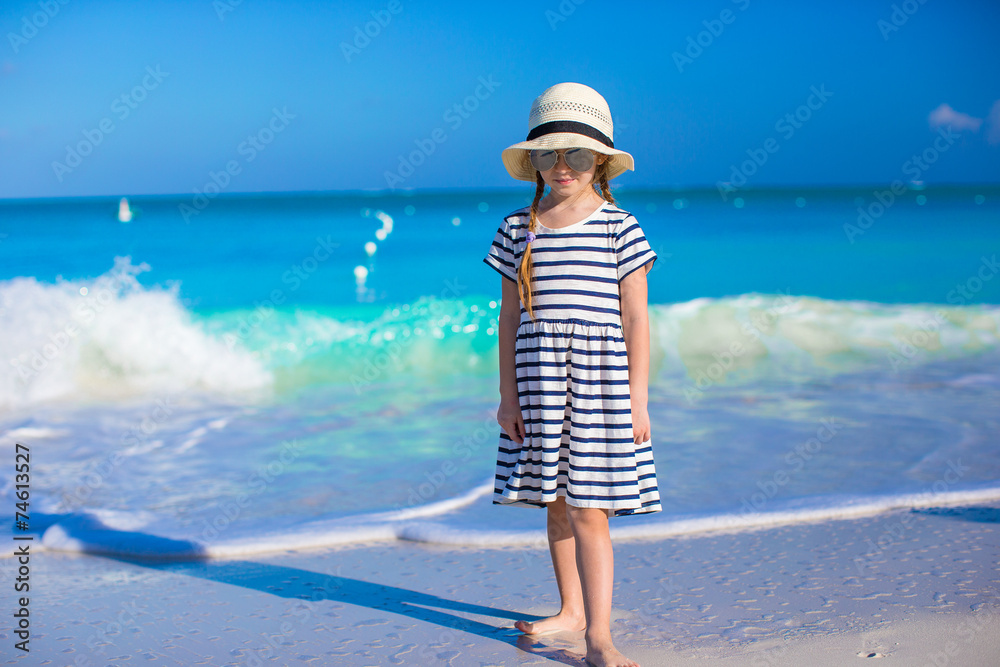 Adorable little girl during beach vacation have fun Adorable little girl during beach vacation have fun