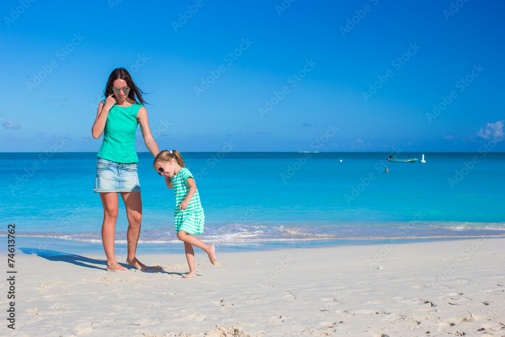 Adorable little girl with mother during summer vacation Adorable little girl with mother during summer vacation
