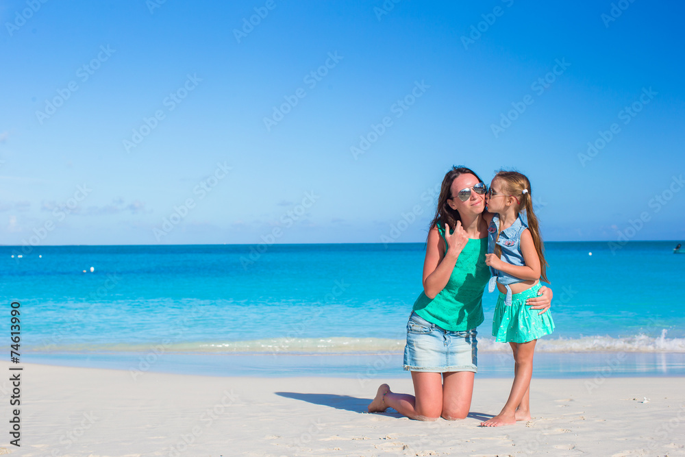 Young mother and adorable little daughter enjoy summer vacation Young mother and adorable little daughter enjoy summer vacation