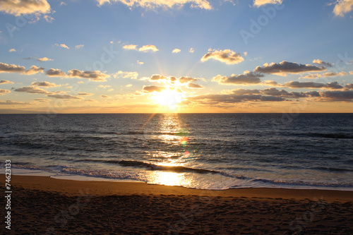 Sea  Sun and Clouds