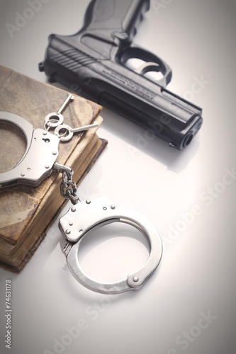 handcuffs and gun