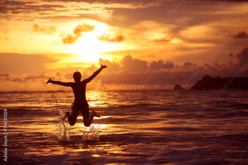 Caucasian woman rests at beautiful seashore