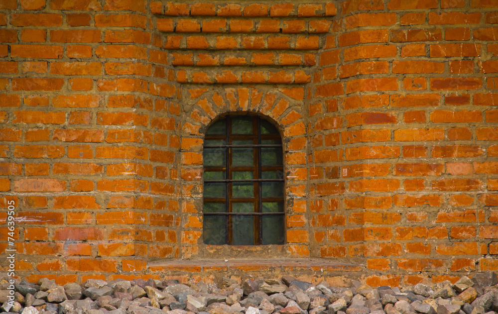 Old brick wall with window closeup