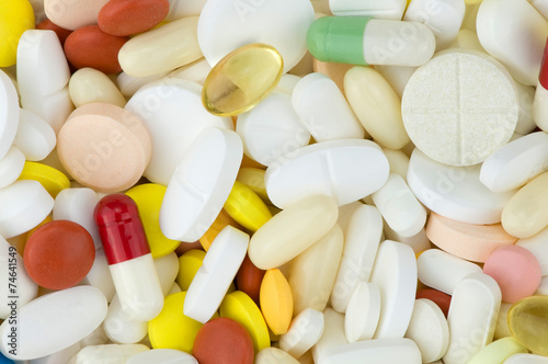 many colored drugs pills shapes texture background