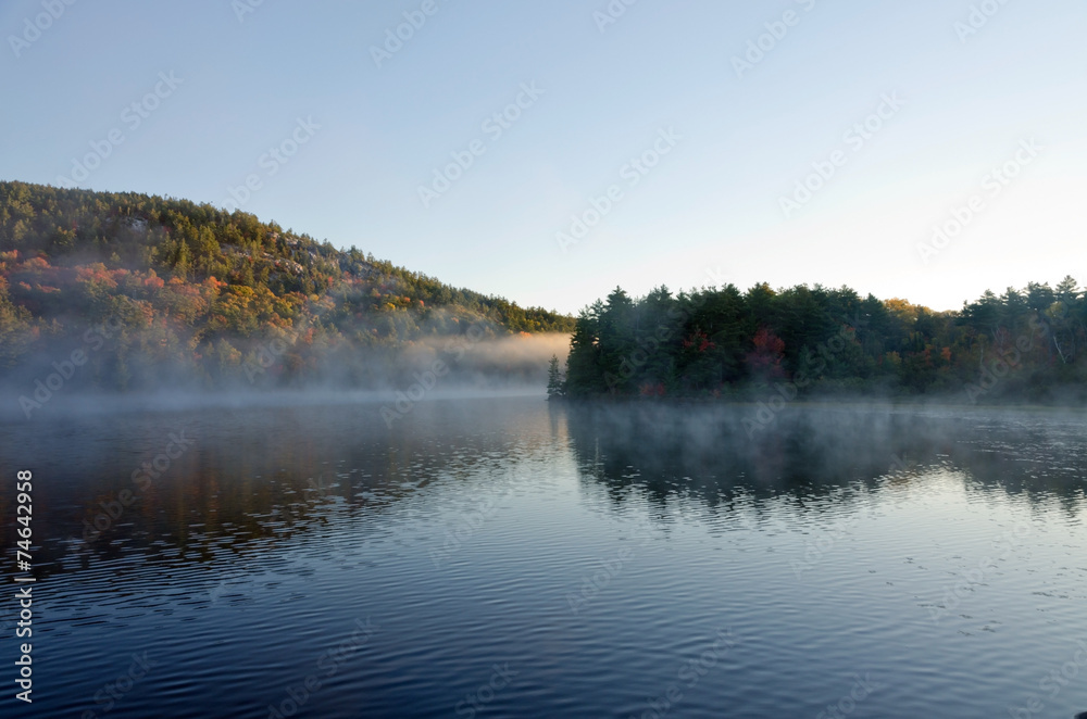 Sunrise above forest lake Sunrise above forest lake