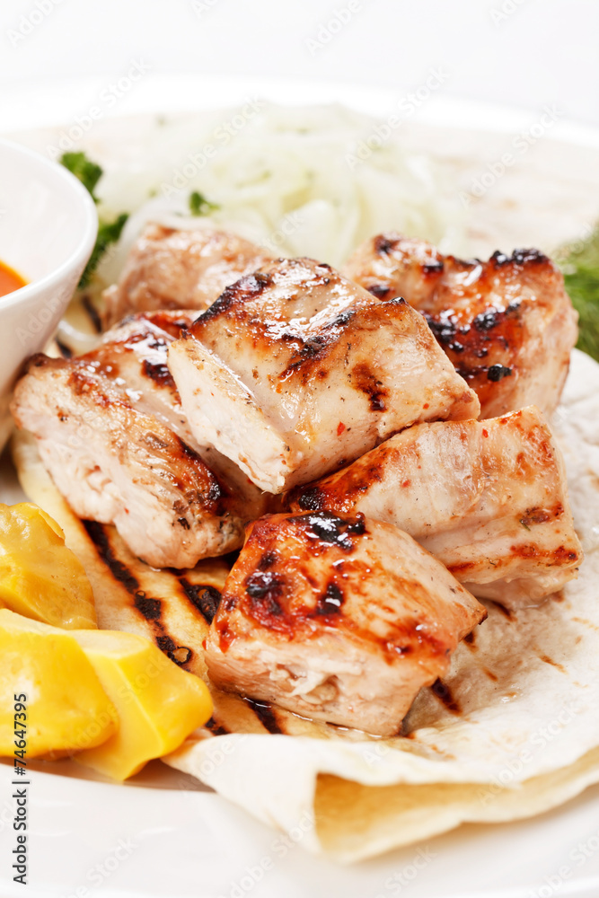 chicken with tortilla and sauce