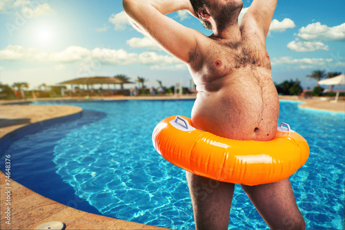 Strange naked man at the pool Fotobehang
