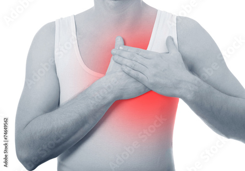 man holding to the chest, heart attack or arrhythmia photo