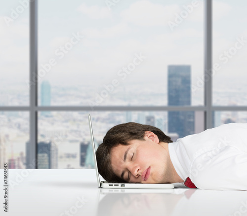 businessman sleeping in office