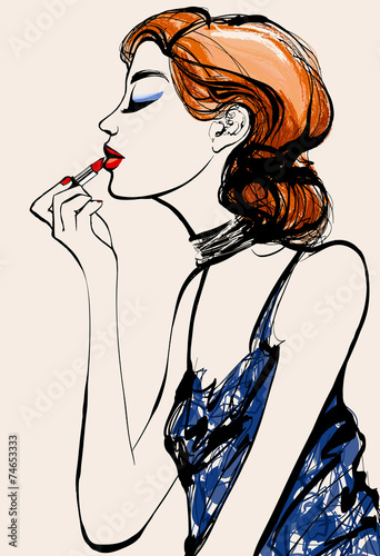 Attractive woman fashion model applying lipstick