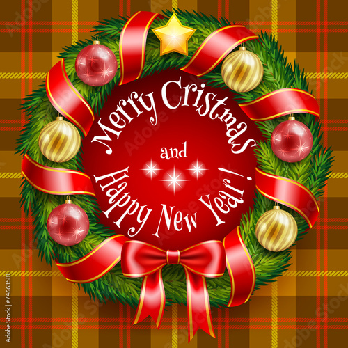 Christmas wreath on a tan plaid background
