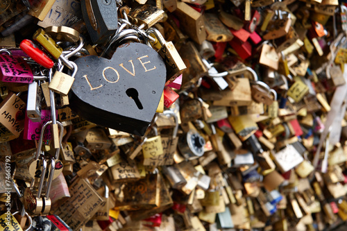 Love locks on The Bridge of Arts (The Bridge of Kisses) in Paris