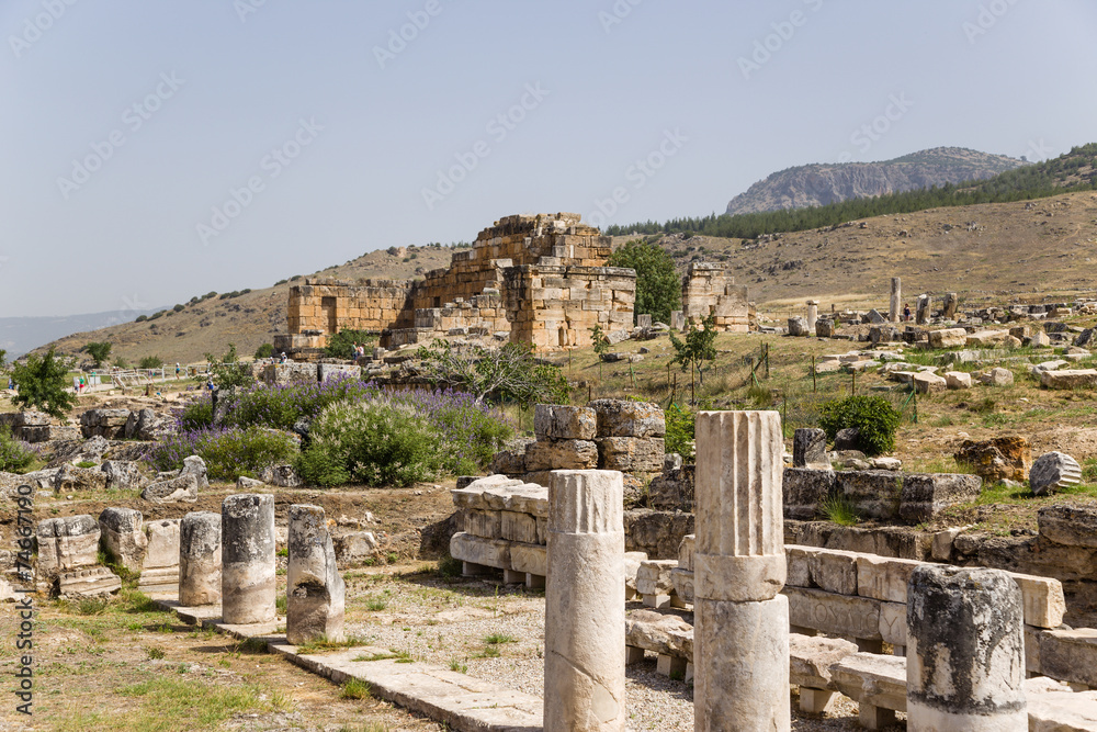 The ruins of the marble portico and fountain Nymphaeum, I - II c