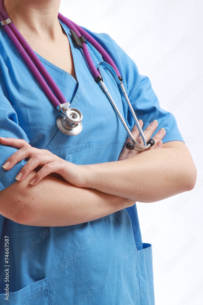 Closeup of a female doctor or a nurse with crossed arms, Closeup of a female doctor or a nurse with crossed arms,
