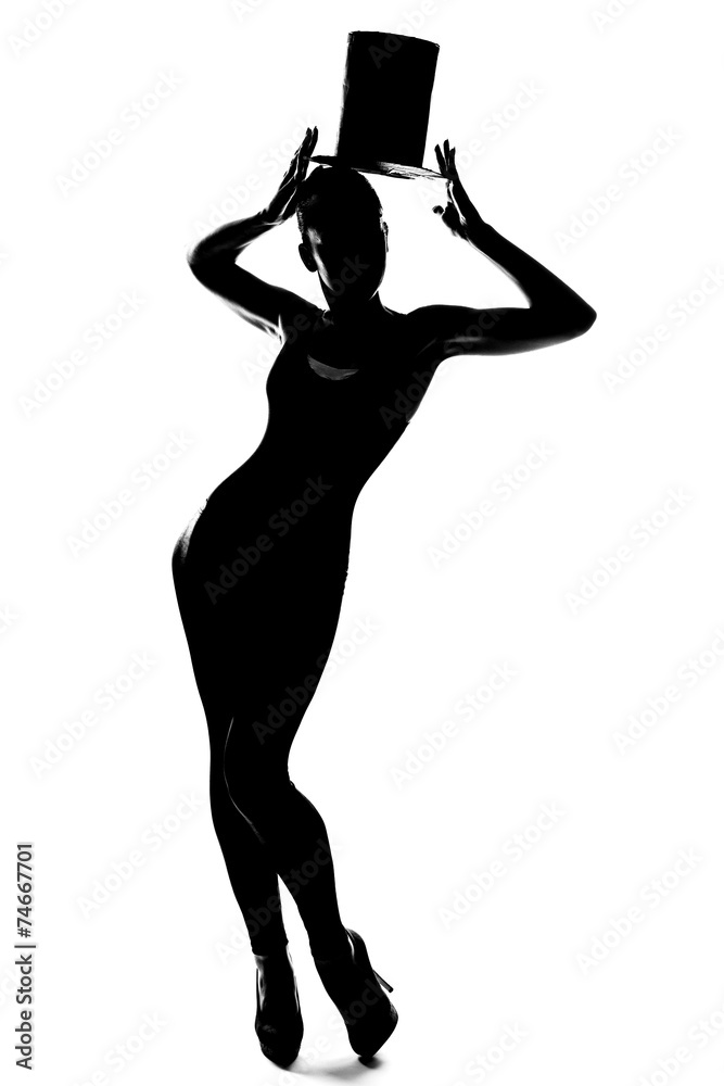 Fototapeta premium Silhouette of fashionable girl with cylinder