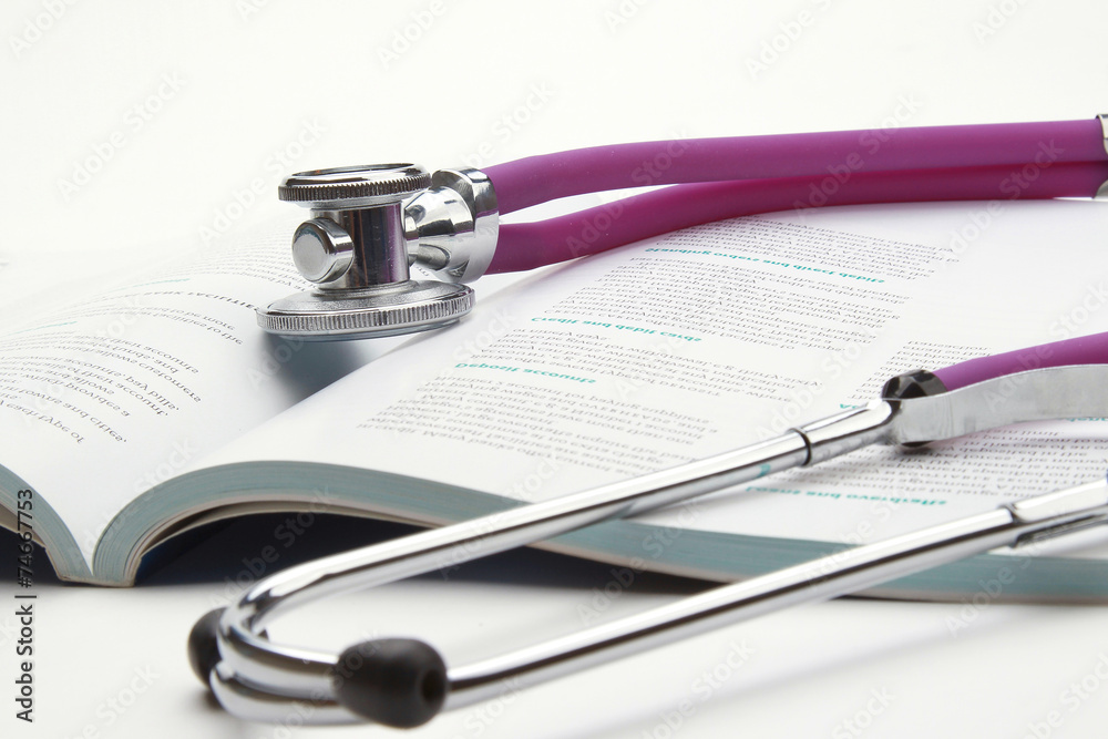 book and stethoscope isolated on white background book and stethoscope isolated on white background