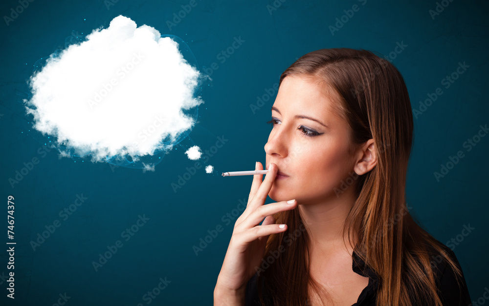Obraz premium Young woman smoking unhealthy cigarette with dense smoke