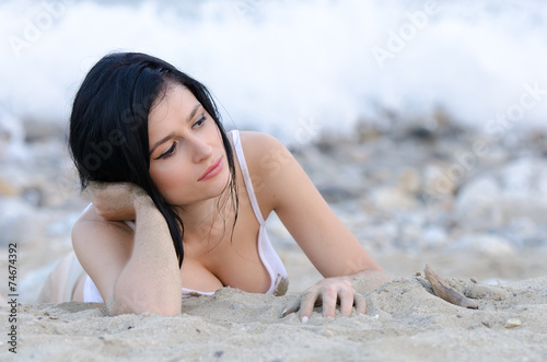 Slika na platnu Wet t-shirt at the beach  woman with perfect big breast
