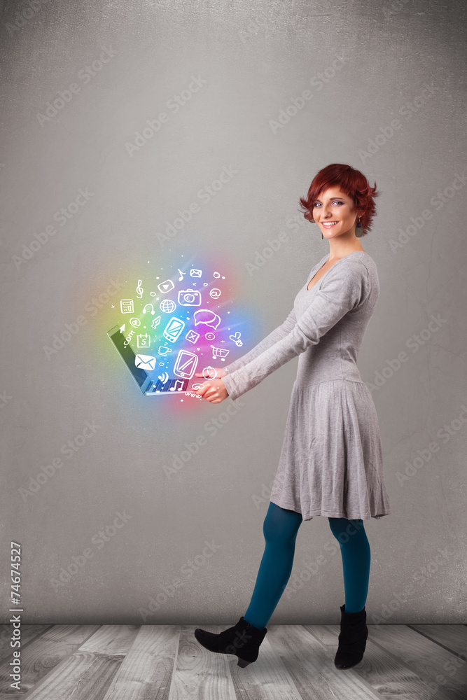 Young lady holding notebook with colorful hand drawn multimedia Young lady holding notebook with colorful hand drawn multimedia