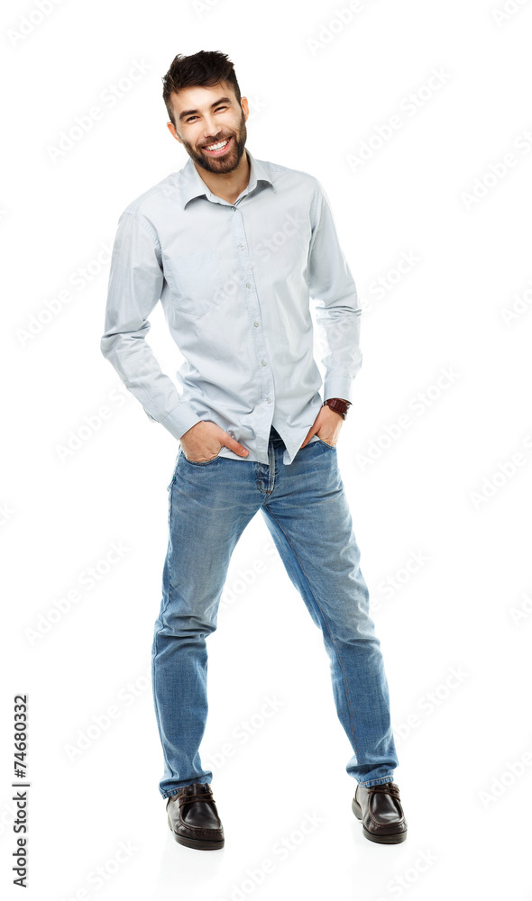A young bearded man smiling isolated on white