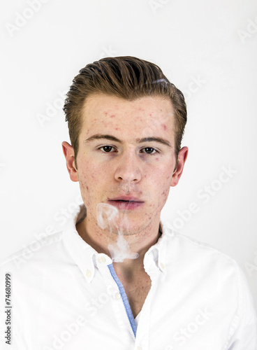 smart looking teenage boy in white shirt