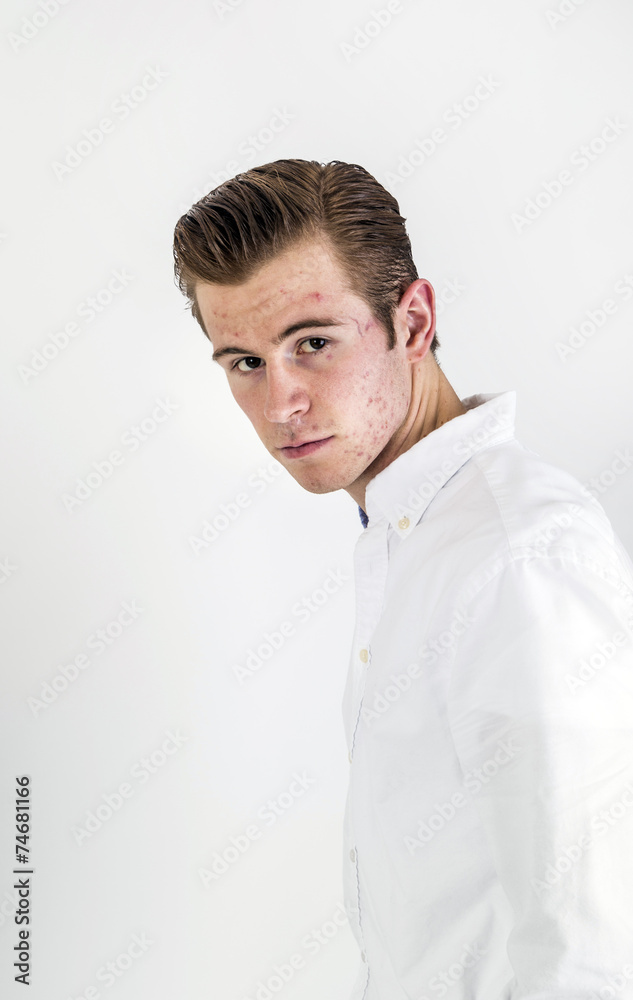 smart looking teenage boy in white shirt smart looking teenage boy in white shirt