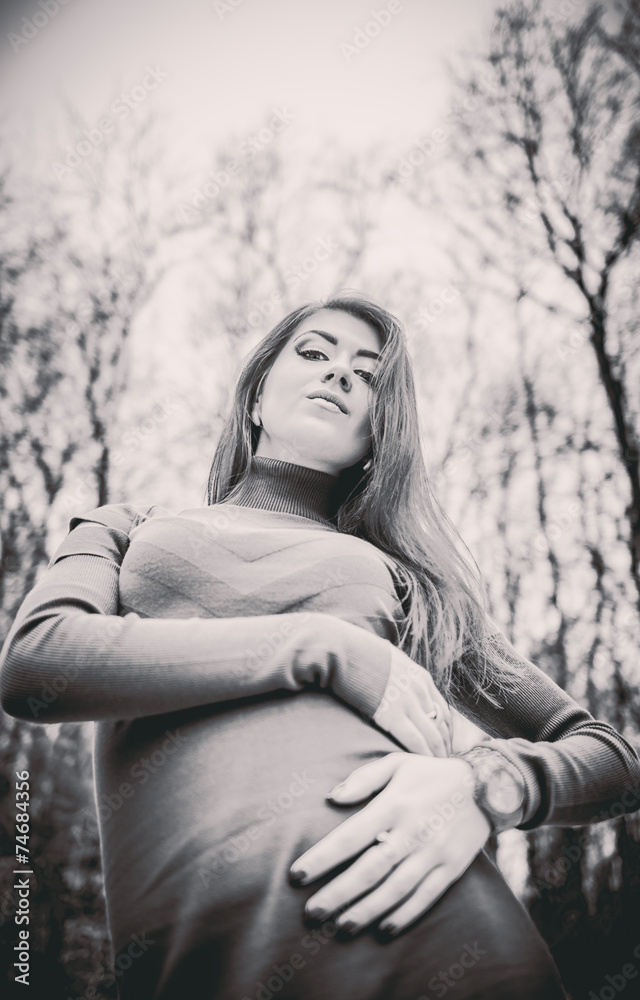 Young pretty girl outdoor in the forest