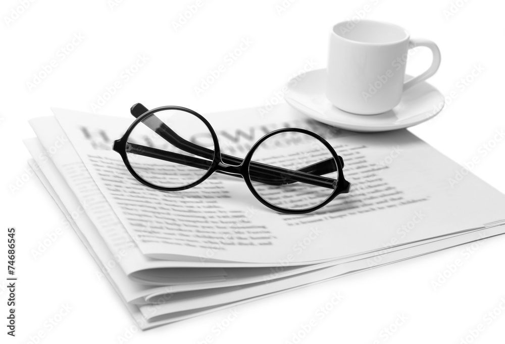Glasses and newspapers, isolated on white