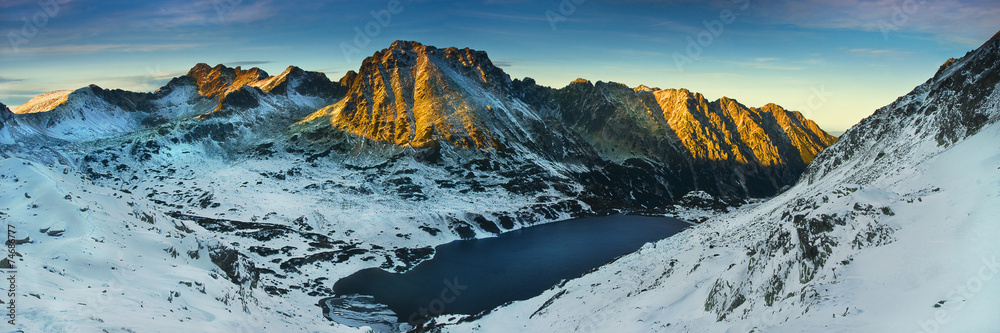 Panoramic winter view of the five lakes valley in tatra mountain