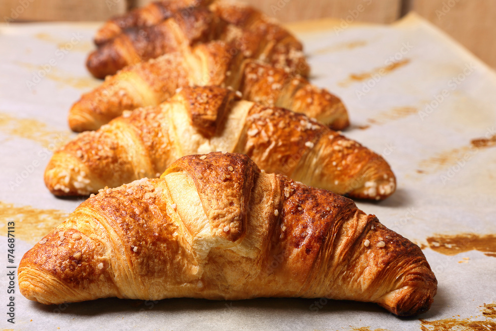 Fresh croissants removed from the oven