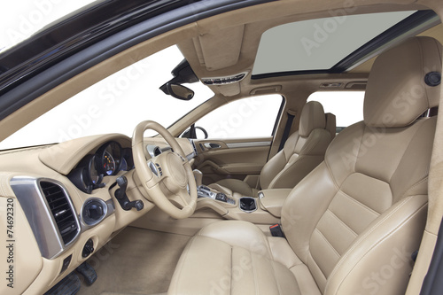 Interior of car. Beige cockpit with steel decoration © dmindphoto