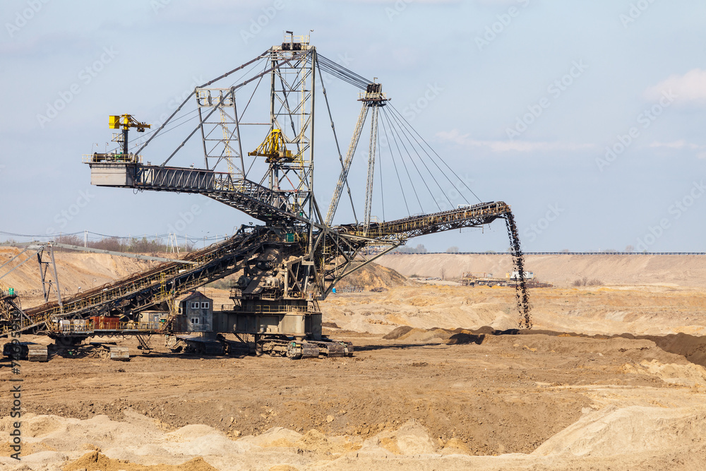 Opencast brown coal mine. Giant excavator.