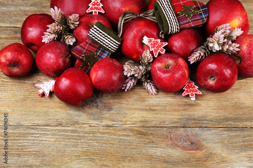 Christmas apples on wooden table