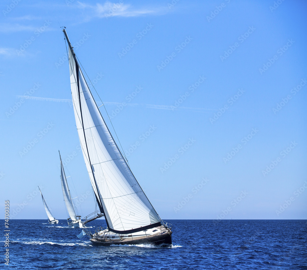 Sailing in the Sea. Race cruising yachts. Luxurious lifestyle.