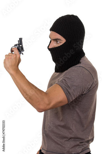 male thief wearing mask and holding gun isolated