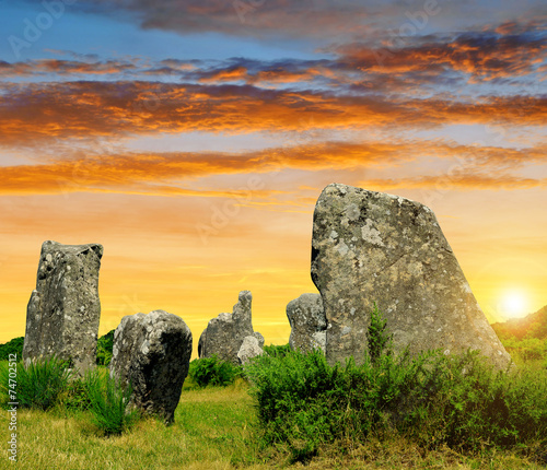 Megalithic monuments menhirs in Carnac,Brittany, France photo