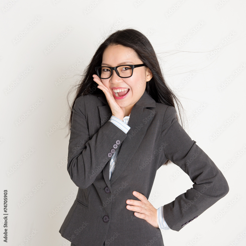 Surprised Asian business woman looking at camera Surprised Asian business woman looking at camera