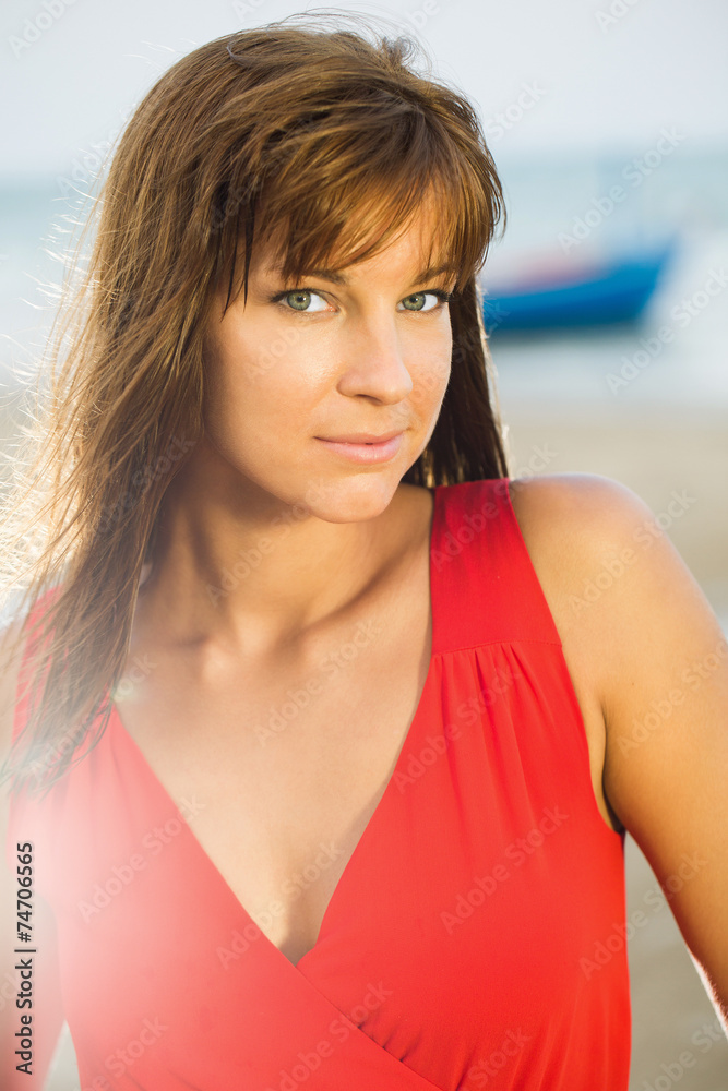 Smiling beautiful woman on the beach. Close up Portrait. Smiling beautiful woman on the beach. Close up Portrait.
